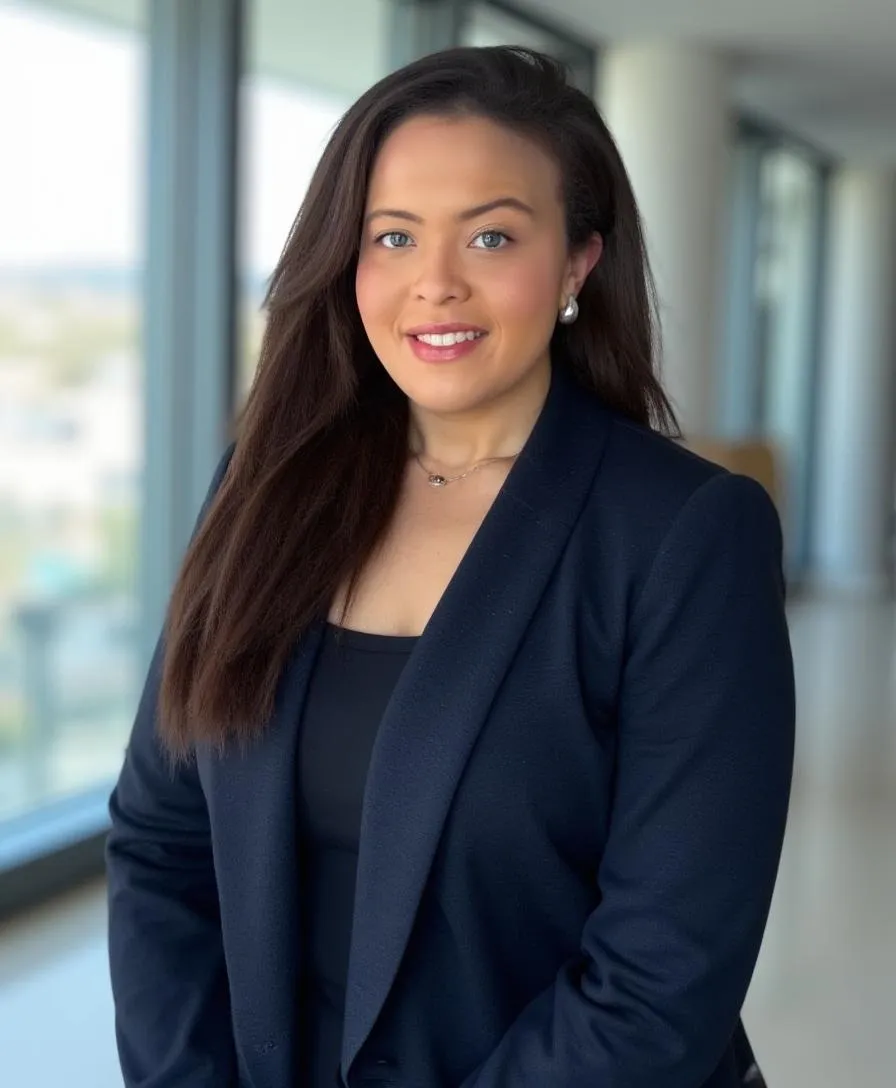Smiling professional woman in navy blazer