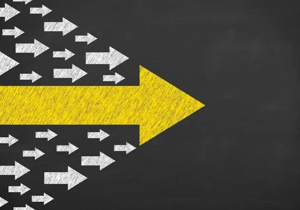 A large yellow arrow leads forward, surrounded by smaller white arrows pointing the same way.